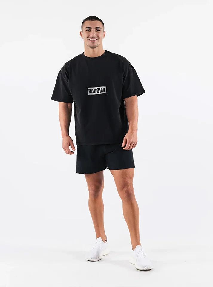 Men oversized gym t shirt with bold 'Radowl' branding, designed for superior performance and style. Ideal for gym workouts and athletic wear, this oversized t-shirt is made from soft bio-washed cotton for optimal comfort.