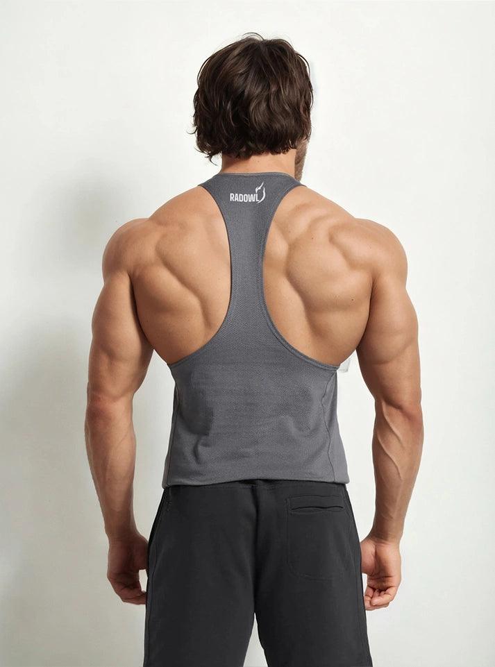 Gym stringer vest for men in grey, featuring enhanced airflow and natural movement, ideal for bodybuilding.