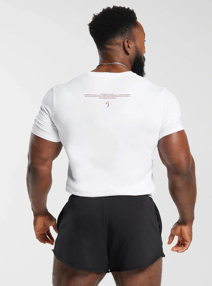 Back view of man in Sovereign Of Leg White T-Shirt, emphasizing slim fit and comfortable fabric. Ideal for gym workouts, this athletic t-shirt provides a sleek look for gym clothing for guys.