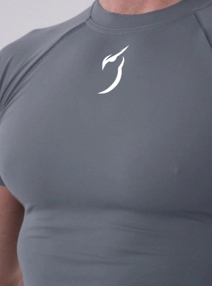 High-performance grey compression tee for men - designed for fitness enthusiasts, offering a second-skin feel and enhanced comfort during workouts.